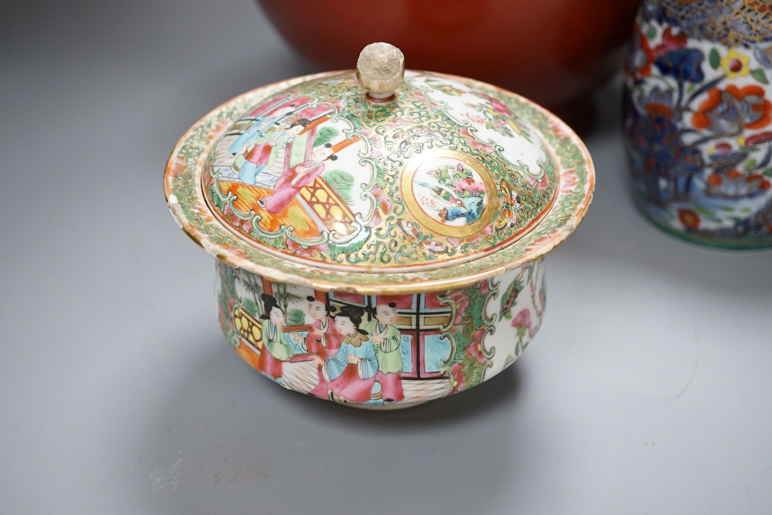 A 19th century Chinese famille rose pot and cover, 15cm diam., together with a decorative Chinese jug and large monochrome china pot